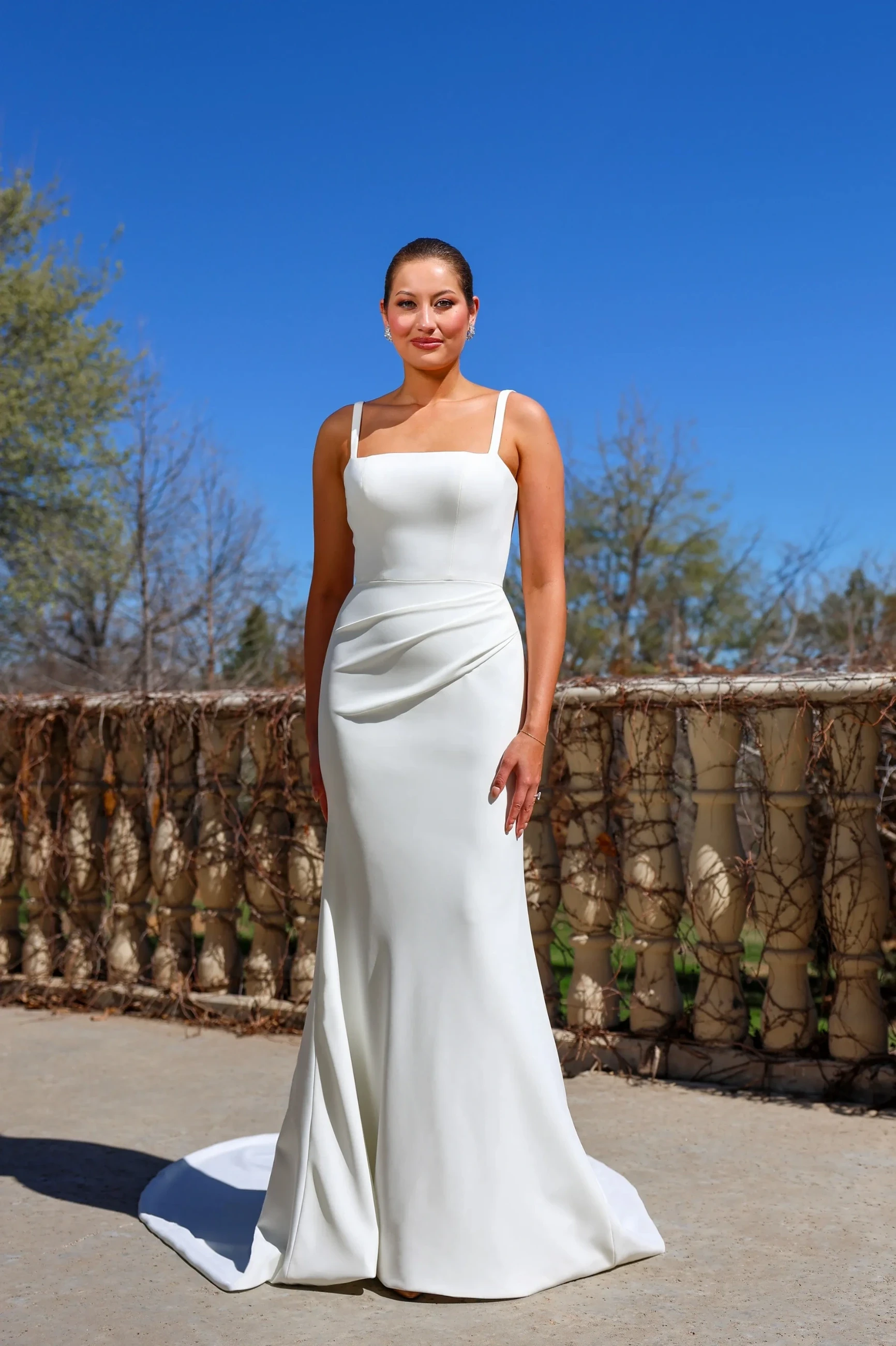 Model wearing white Casablanca dress